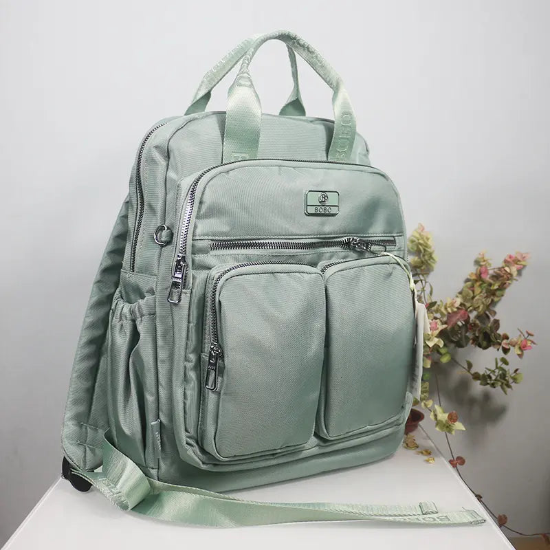 Sac à dos femme vert pastel – Élégant, pratique et grande capacité pour un usage quotidien