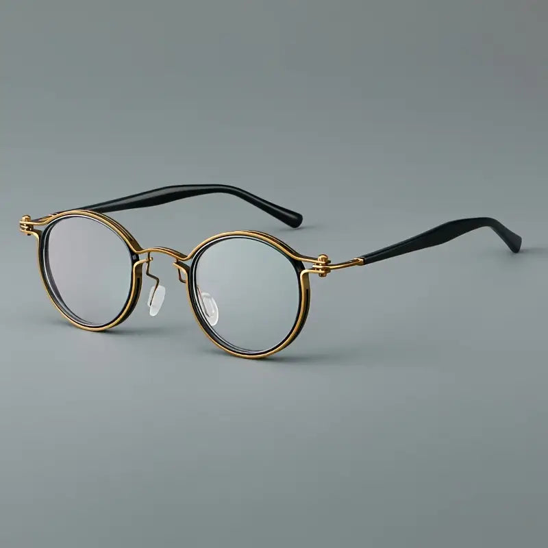 Lunettes homme rondes rétro – Monture dorée et noire élégante avec verres transparents
