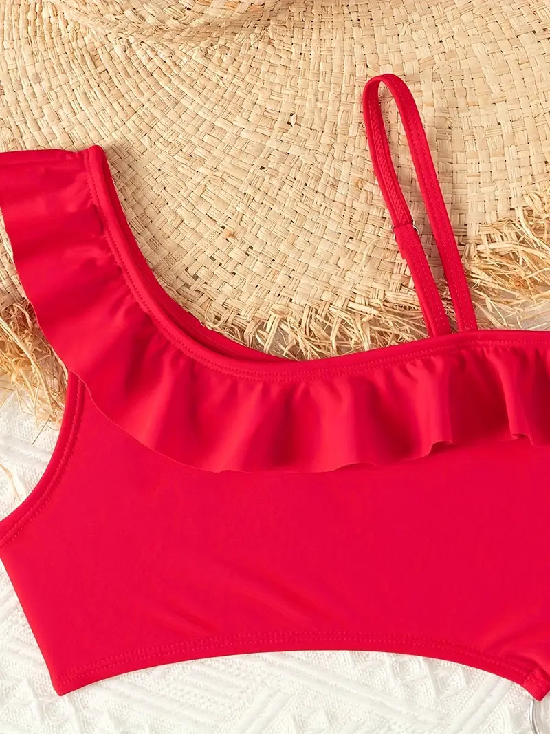 Maillot de bain fille noir une pièce asymétrique avec volant – Élégant et tendance pour l’été