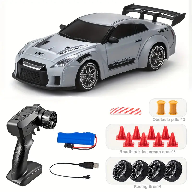 Voiture Télécommandée de Course – Jouet Électronique Rapide avec Pneus de Rechange, Obstacles et Batterie Rechargeable