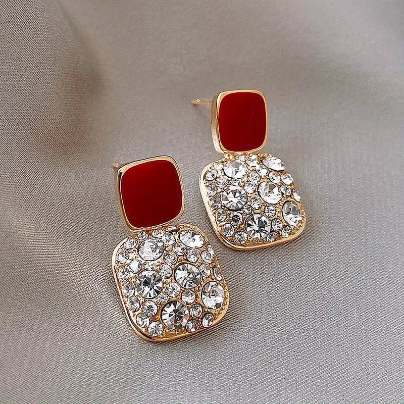 Boucles d’oreilles mariage femme – Pendants dorés avec cristaux scintillants et pierre rouge élégante