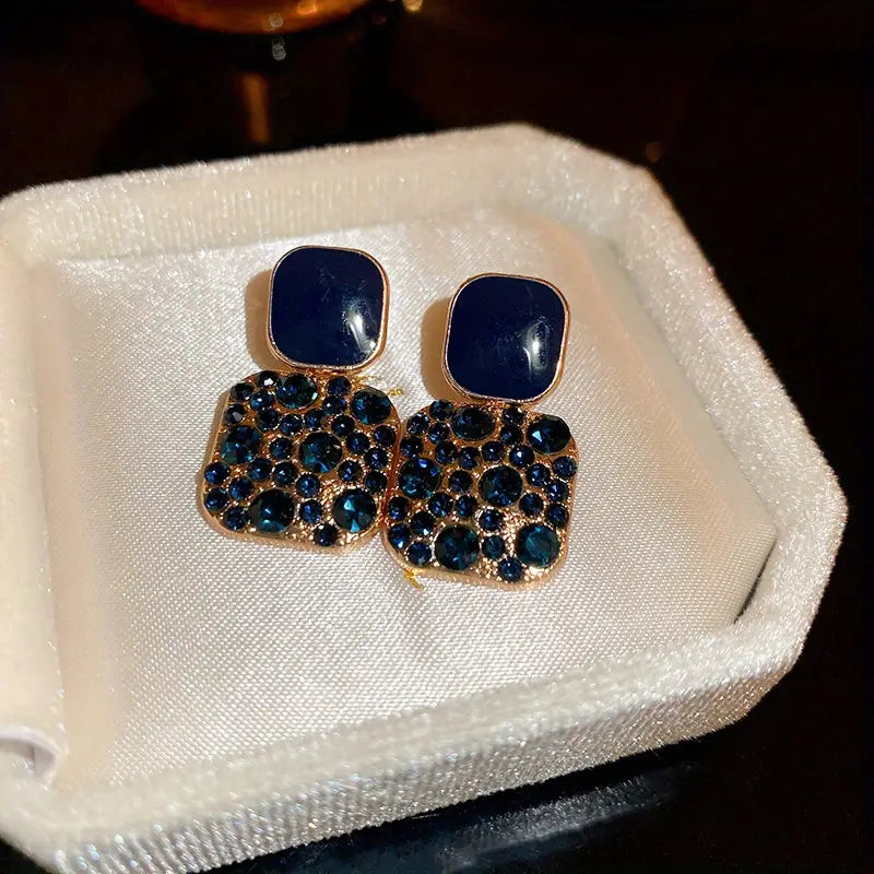 Boucles d’oreilles mariage femme – Pendants dorés avec cristaux scintillants et pierre rouge élégante