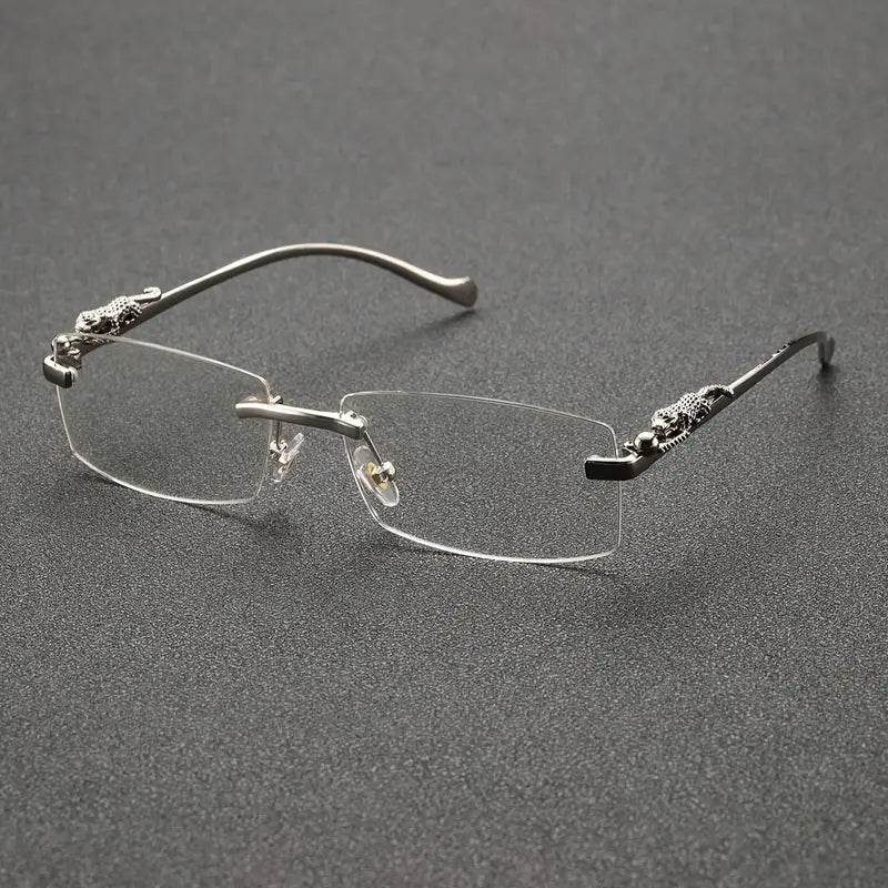 Lunettes homme sans monture – Design élégant avec branches métalliques argentées et détails gravés