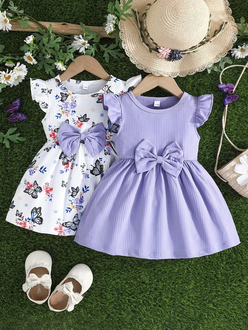 Lot de 2 robes fille été avec nœud – Robe lilas unie et robe blanche à fleurs papillons