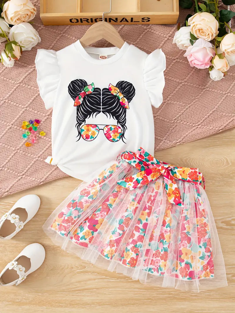 Chemise fille blanche à manches volantées avec jupe noire à cœurs colorés – tenue élégante et tendance