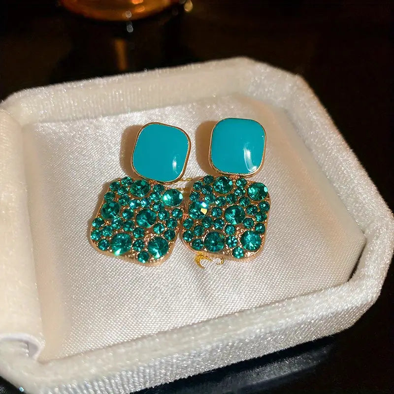 Boucles d’oreilles mariage femme – Pendants dorés avec cristaux scintillants et pierre rouge élégante
