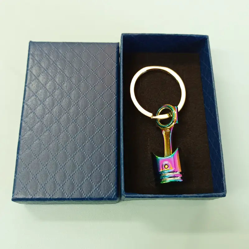 Porte-clés piston voiture en métal multicolore – Breloque mécanique originale pour homme