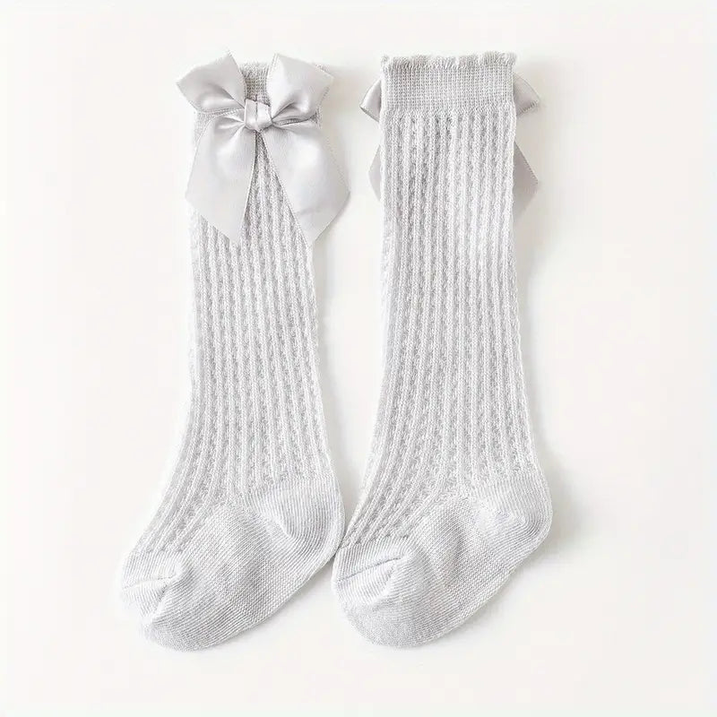 Chaussettes hautes bébé fille – Bas dentelle blanc avec nœud élégant, confortables et respirants pour toutes occasions