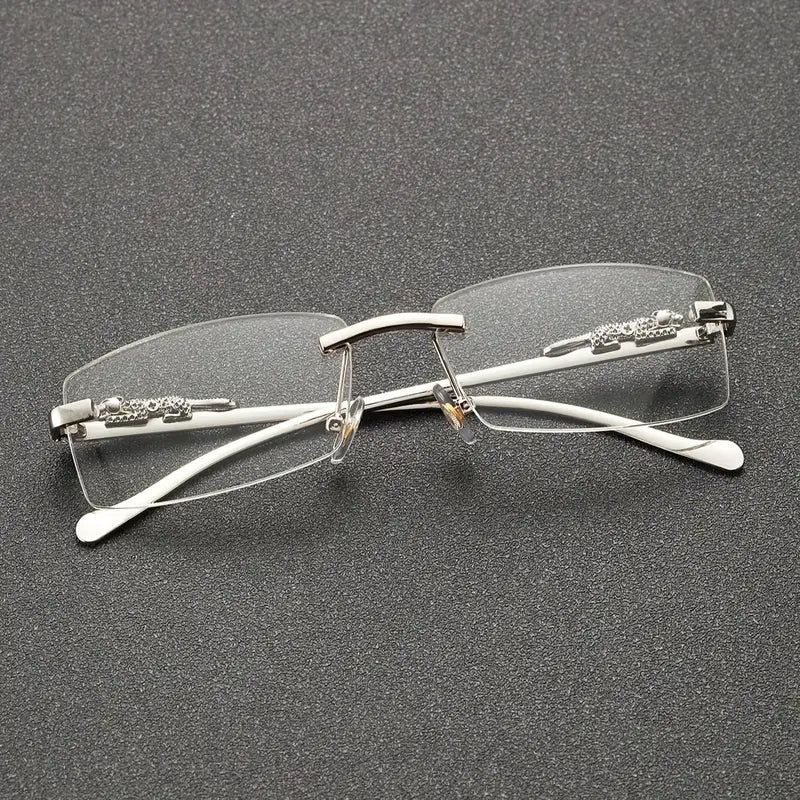 Lunettes homme sans monture – Design élégant avec branches métalliques argentées et détails gravés