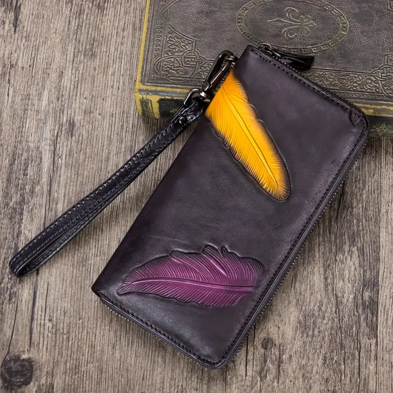 Portefeuille femme cuir vert – Design artistique avec plumes colorées