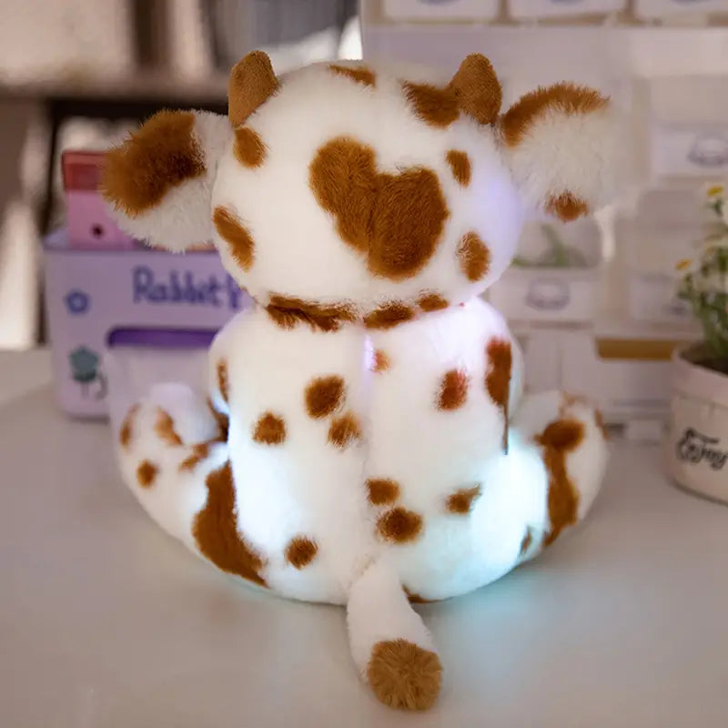 Peluche vache lumineuse noir/marron et blanc – Doudou LED doux et rigolo pour enfants