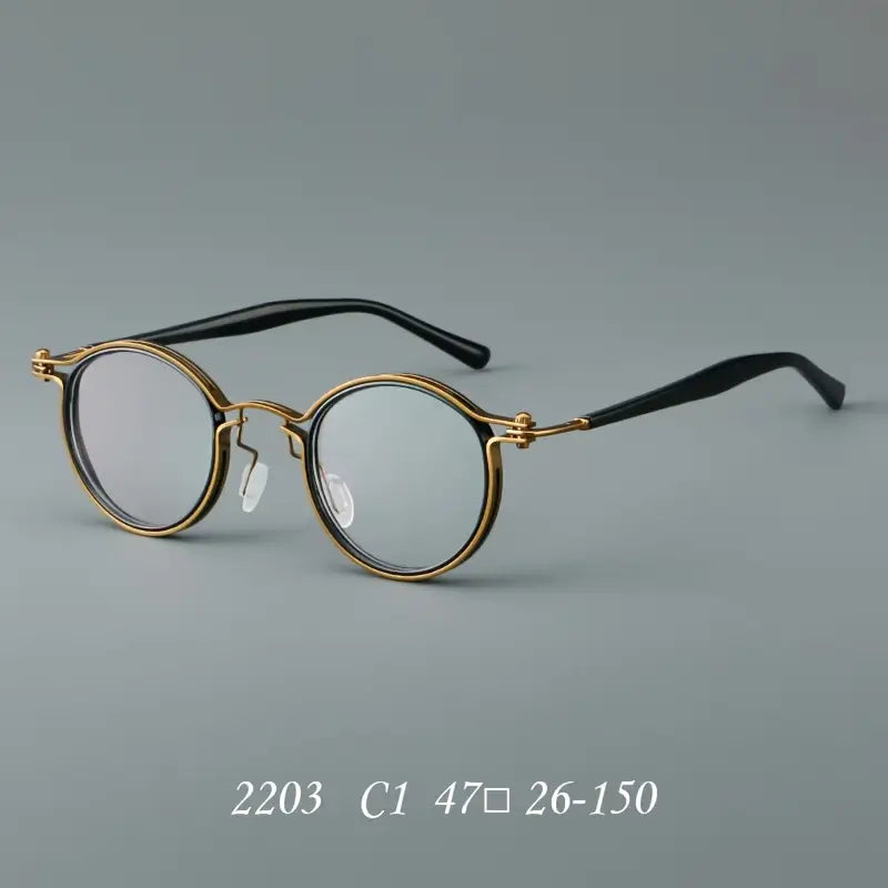 Lunettes homme rondes rétro – Monture dorée et noire élégante avec verres transparents