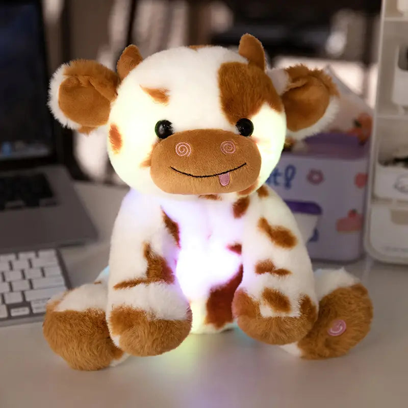 Peluche vache lumineuse noir/marron et blanc – Doudou LED doux et rigolo pour enfants
