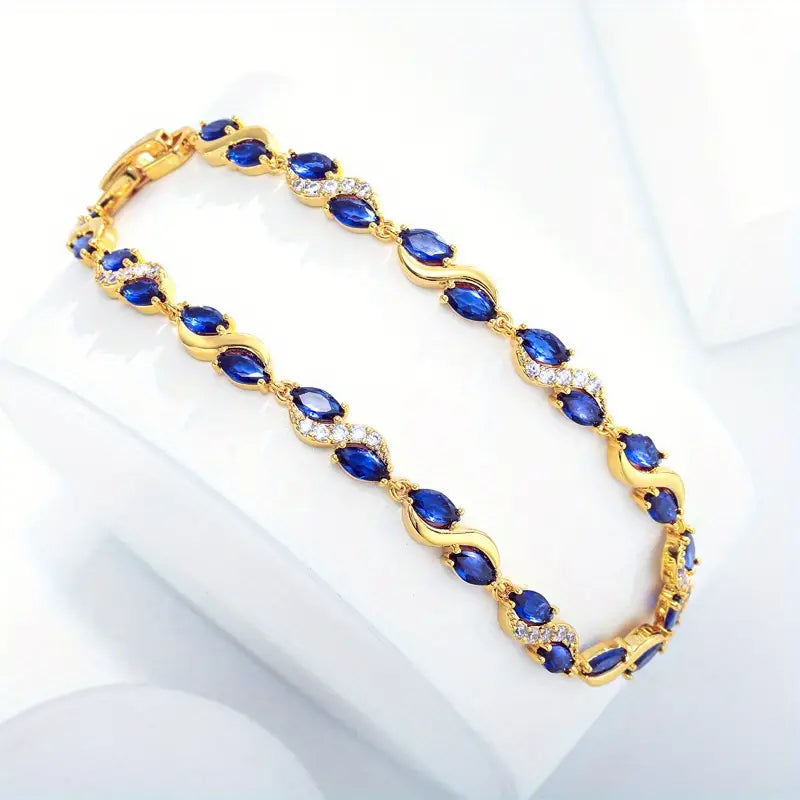 Bracelet femme doré avec cristaux bleus et zircons – Bijou élégant et raffiné