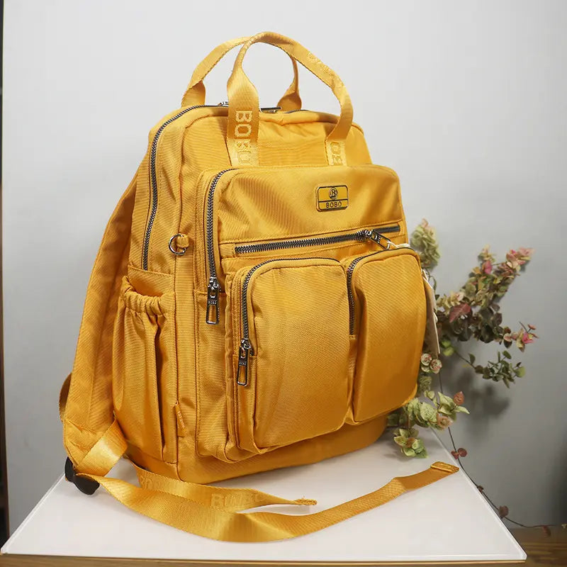 Sac à dos femme vert pastel – Élégant, pratique et grande capacité pour un usage quotidien