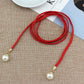 Ceinture femme fine tressée rouge avec perles – Accessoire chic et élégant