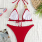 Bas de bikini à maillons dorés – Coupe échancrée et détails glamour pour un été éclatant