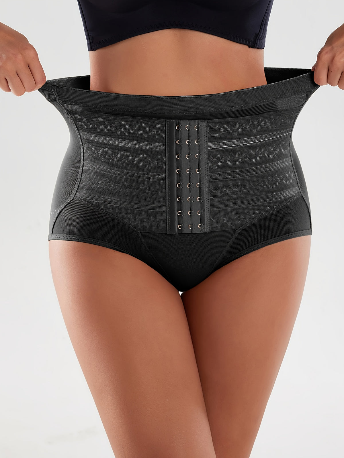 Un body sculptant taille haute boutonnée sur le devant pour femmes