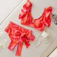 Bikini à volants – Haut élégant avec décolleté doré et culotte nouée avec grand nœud