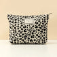 Trousse de maquillage imprimé léopard  Pochette cosmétique tendance, pratique et spacieuse