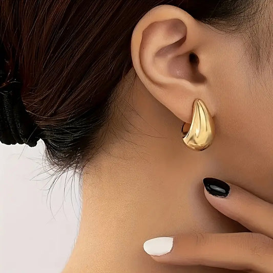 Boucles d’oreilles femme dorées en forme de goutte – Bijoux élégants et tendance