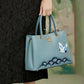 Sac à main femme bleu élégant  Design japonais avec grue brodée et finitions dorées