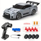 Voiture Télécommandée de Course – Jouet Électronique Rapide avec Pneus de Rechange, Obstacles et Batterie Rechargeable