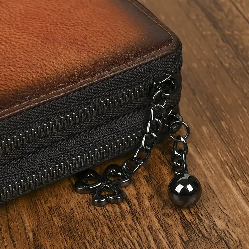 Portefeuille femme en cuir gravé – Design artistique avec motif grue et fleurs