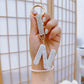 Porte-clés femme lettre initiale strass – Breloque brillante élégante et personnalisée