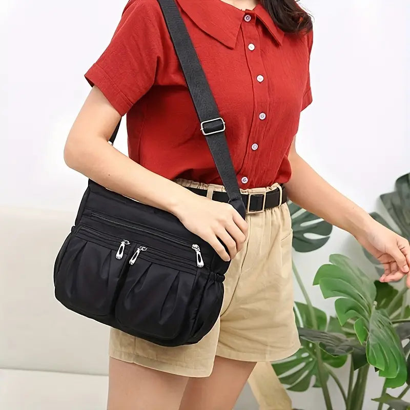 Sac besace femme rouge en nylon imperméable  Léger, pratique et multi poches