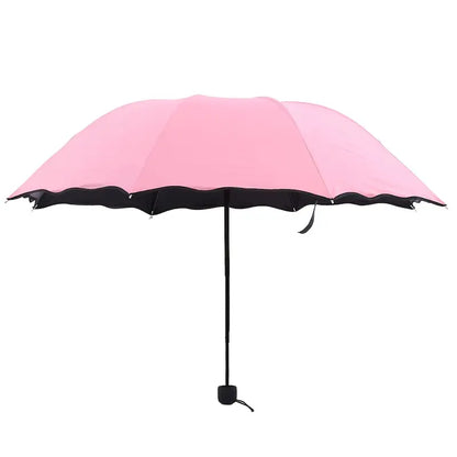 Parapluie pliable rose avec bord ondulé  Léger, compact et résistant au vent