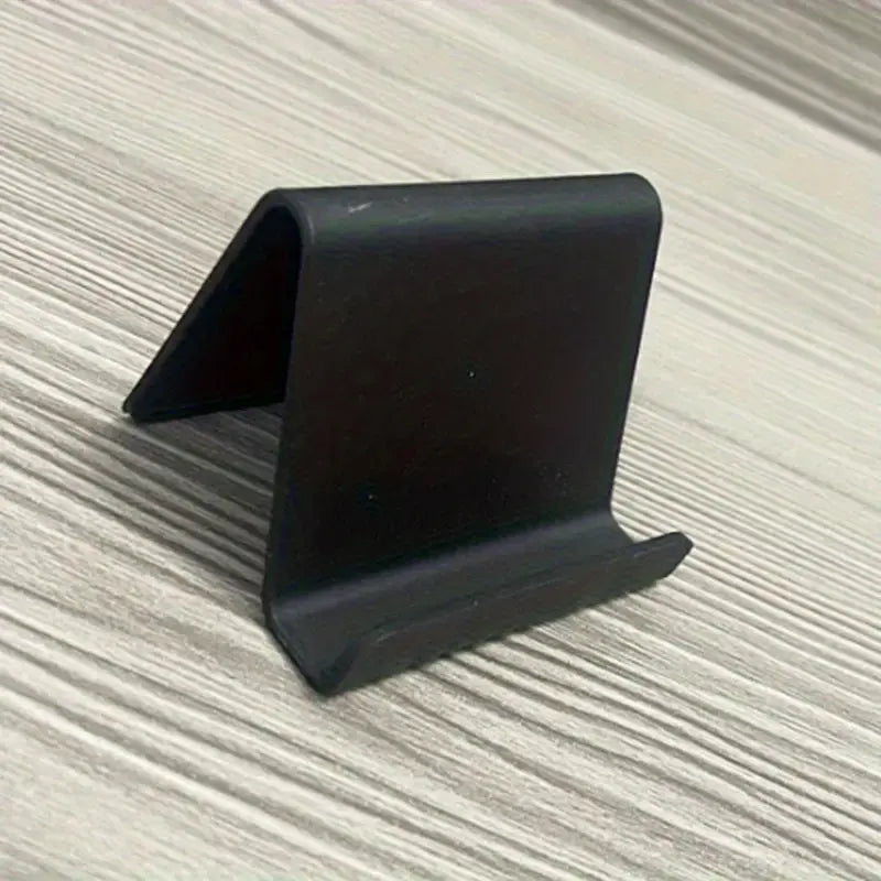 Support Téléphone Bureau Minimaliste – Porte-Téléphone Compact en Plastique Noir pour Table ou Bureau
