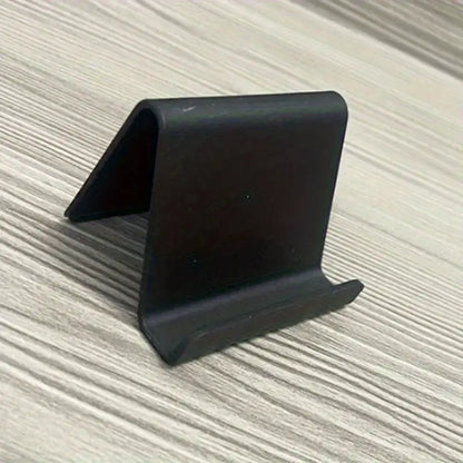 Support Téléphone Bureau Minimaliste – Porte-Téléphone Compact en Plastique Noir pour Table ou Bureau