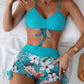 Short de bain floral taille haute pour femme – Coupe galbante et imprimé tropical, parfait pour l’été