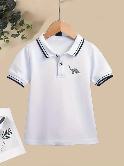 Chemise polo garçon bleu marine à col tricolore et motif dinosaure – tenue élégante et décontractée
