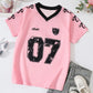 T-shirt fille noir style sportif avec numéro 07