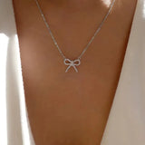 Collier Fin Doré avec Pendentif Nœud Strass, coloris Doré