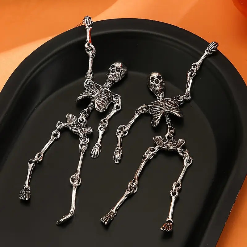 Boucles d’oreilles squelette articulé – Accessoire Halloween gothique tendance