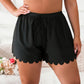Short de bain noir à bords festonnés – Taille haute, ajustable et ultra confortable pour femme pulpeuse