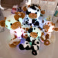 Peluche vache lumineuse noir/marron et blanc – Doudou LED doux et rigolo pour enfants