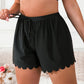 Short de bain noir à bords festonnés – Taille haute, ajustable et ultra confortable pour femme pulpeuse