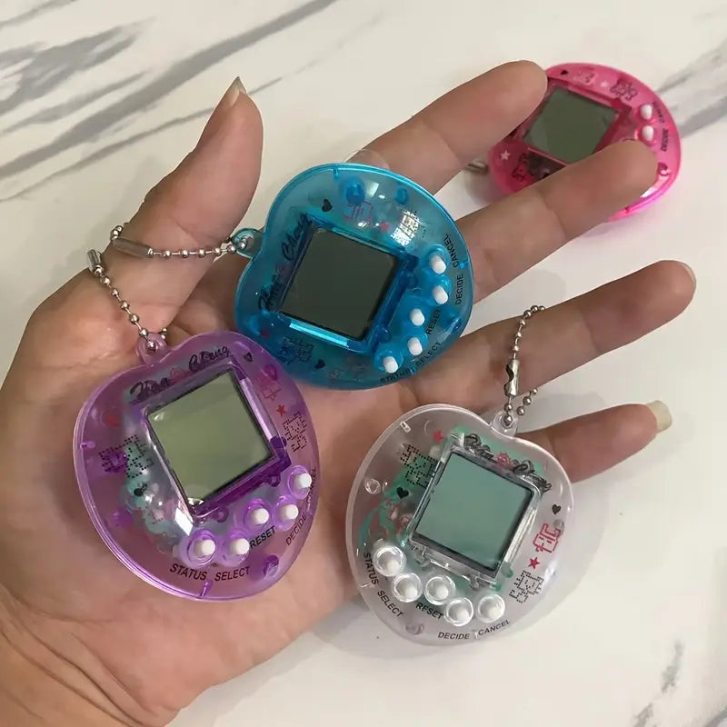 Tamagotchi Rétro Porte-Clés – Jeu Électronique Animaux Virtuels avec Boîtier Transparent Coloré