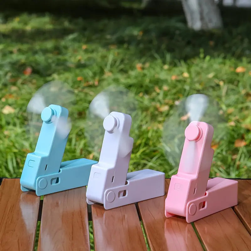 Ventilateur de Poche Pliable – USB Rechargeable, Compact et Silencieux avec LED Intégrée