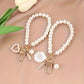 Porte-clés femme perles élégantes – Breloque chic avec pendentif nacre et doré
