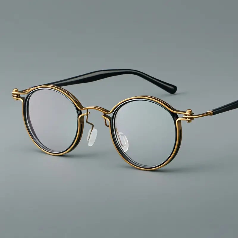 Lunettes homme rondes rétro – Monture dorée et noire élégante avec verres transparents