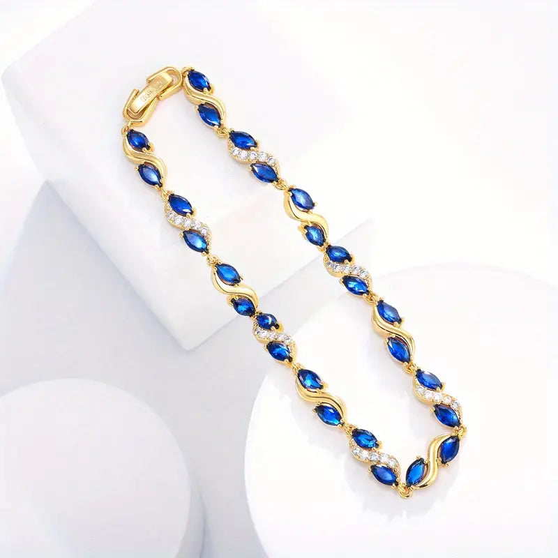 Bracelet femme doré avec cristaux bleus et zircons – Bijou élégant et raffiné