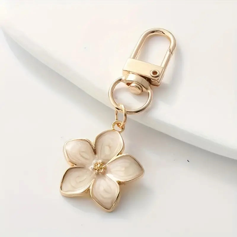 Porte-clés fleur en métal doré – Breloque élégante et féminine pour femme