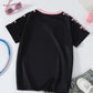 T-shirt fille noir style sportif avec numéro 07