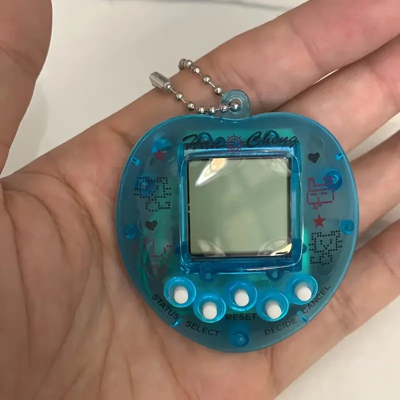 Tamagotchi Rétro Porte-Clés – Jeu Électronique Animaux Virtuels avec Boîtier Transparent Coloré